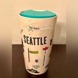 Starbucks 12oz ceramic Seattle travel mug with lid.